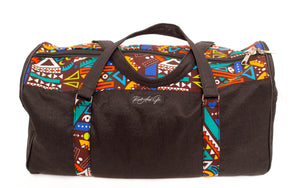 Black canvas duffle bag with African textiles details. Inside pocket and out side pockets to hold smaller items. Bags are perfect for travel, for the gym and weekend getaway.   . Adjustable Straps  . Canvas with African print textiles   . Inside pocket  . Outside pocket with a zipper  Size